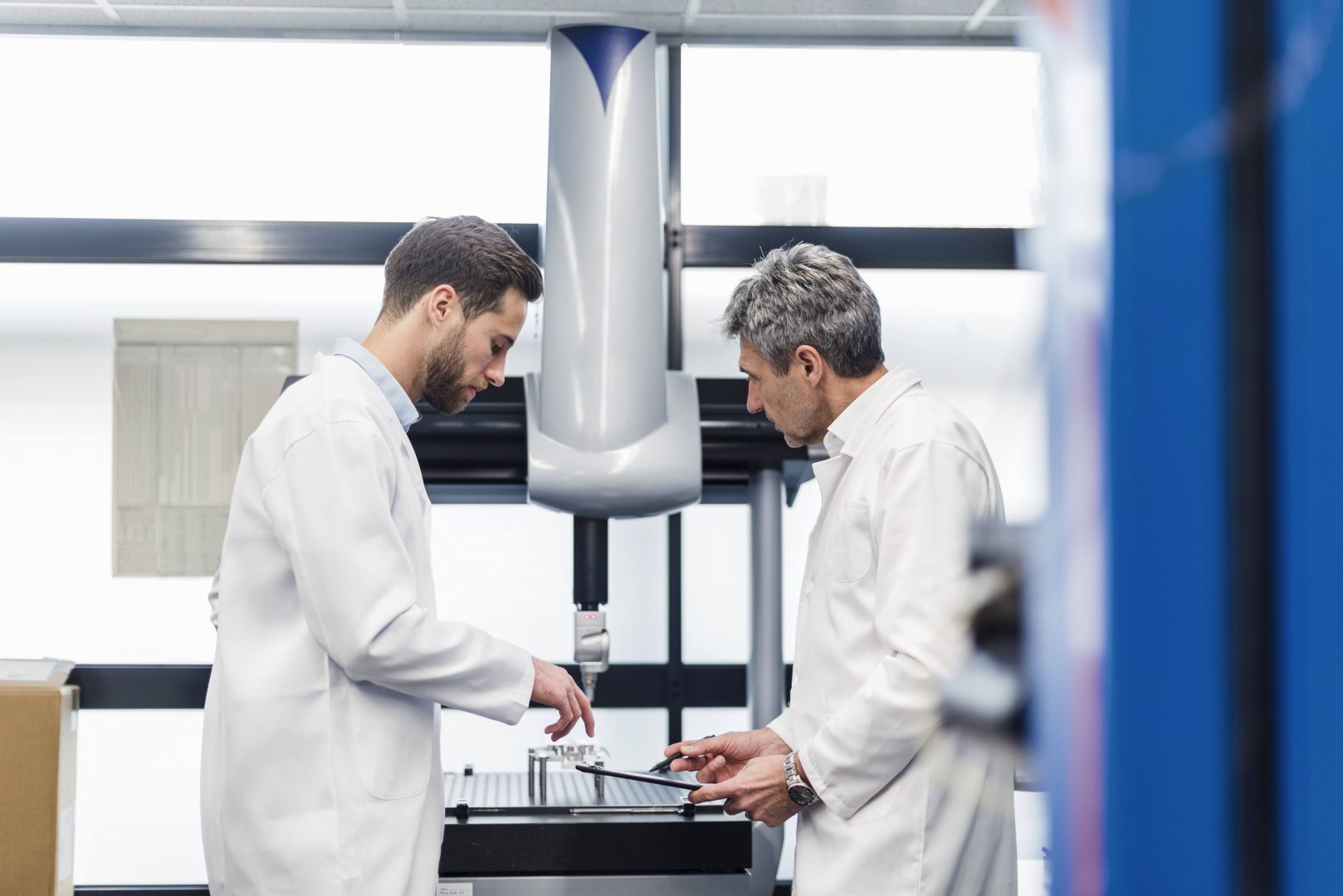 Two male researchers working in lab