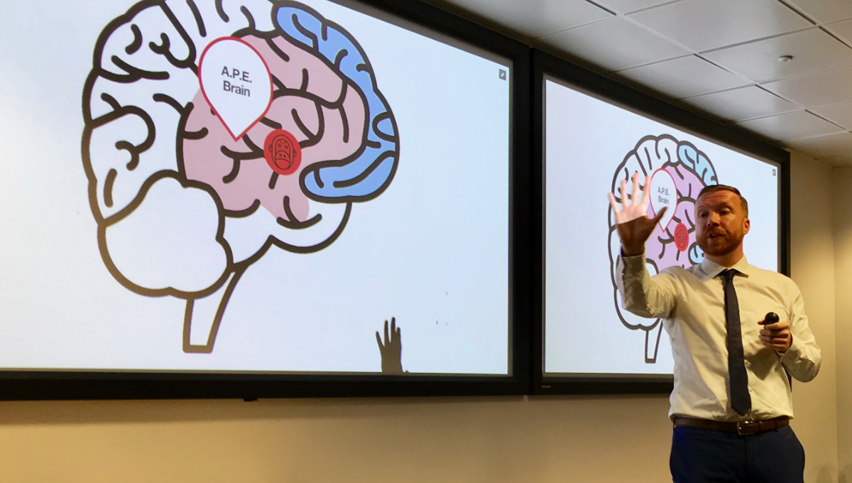 Dr Jon Finn from Tougher Minds presenting at event