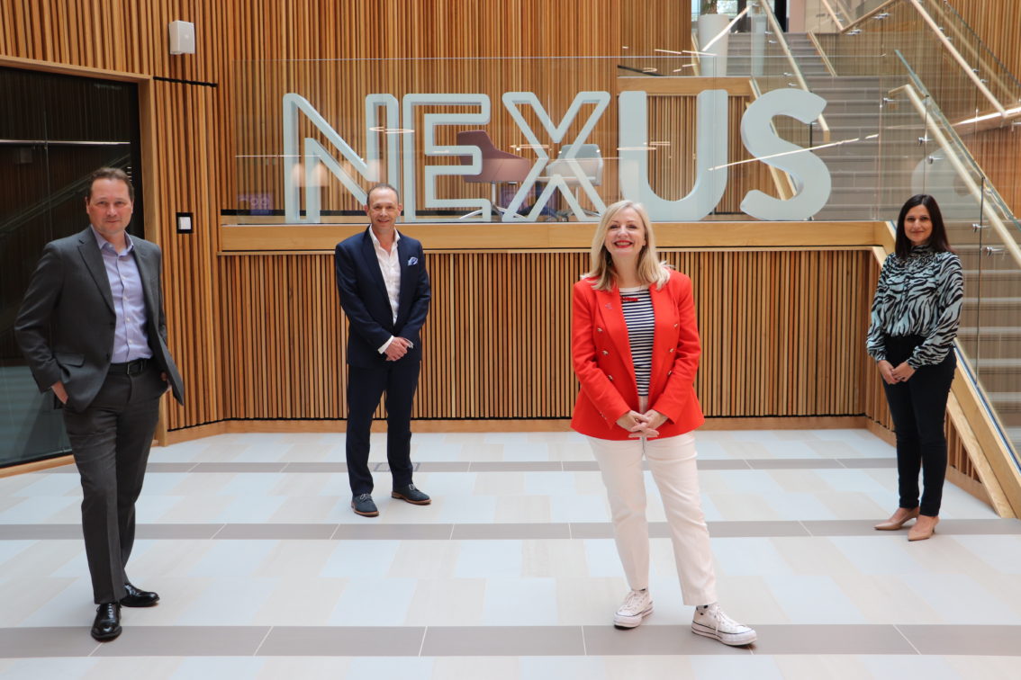 Tracy Brabin, Mayor of West Yorkshire, stood with Professor Nick Plant, Dr Martin Stow and ___ inside the Nexus building