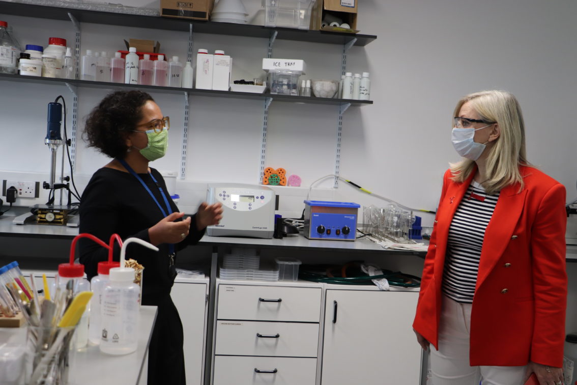 Tracy Brabin, Mayor of West Yorkshire, and Meryem Benhoud, Technical Director at Keracol, talking in a lab