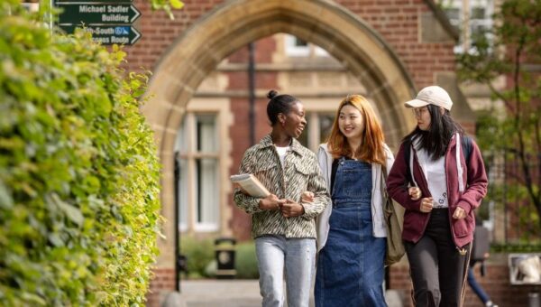 Group of students walking on campus