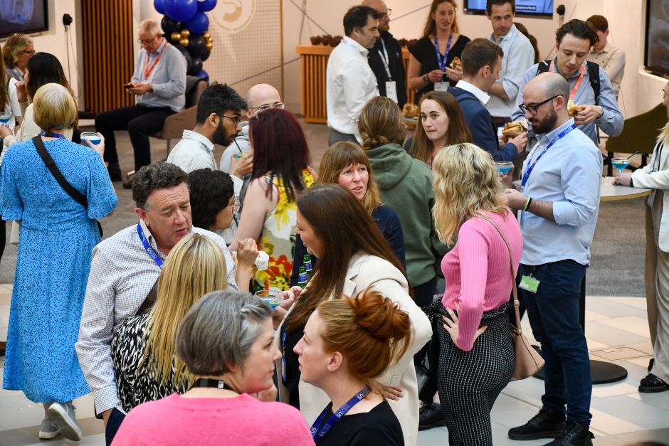 People in a crowd talking