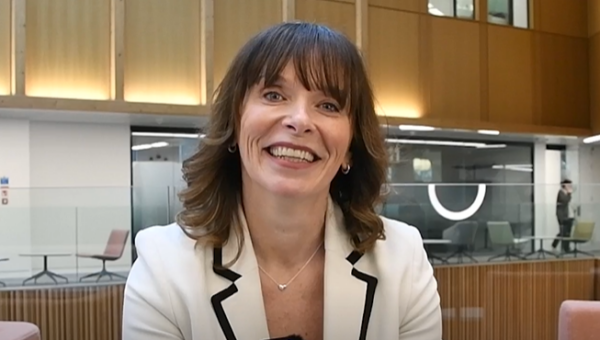 Kelly Hobson smiling to camera.