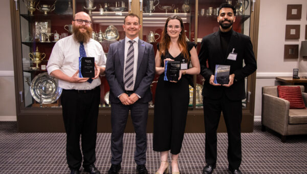 Nexus Innovation Awards winners at the Spark Awards stood with their awards accompanied by Nexus Director Gareth Scargill