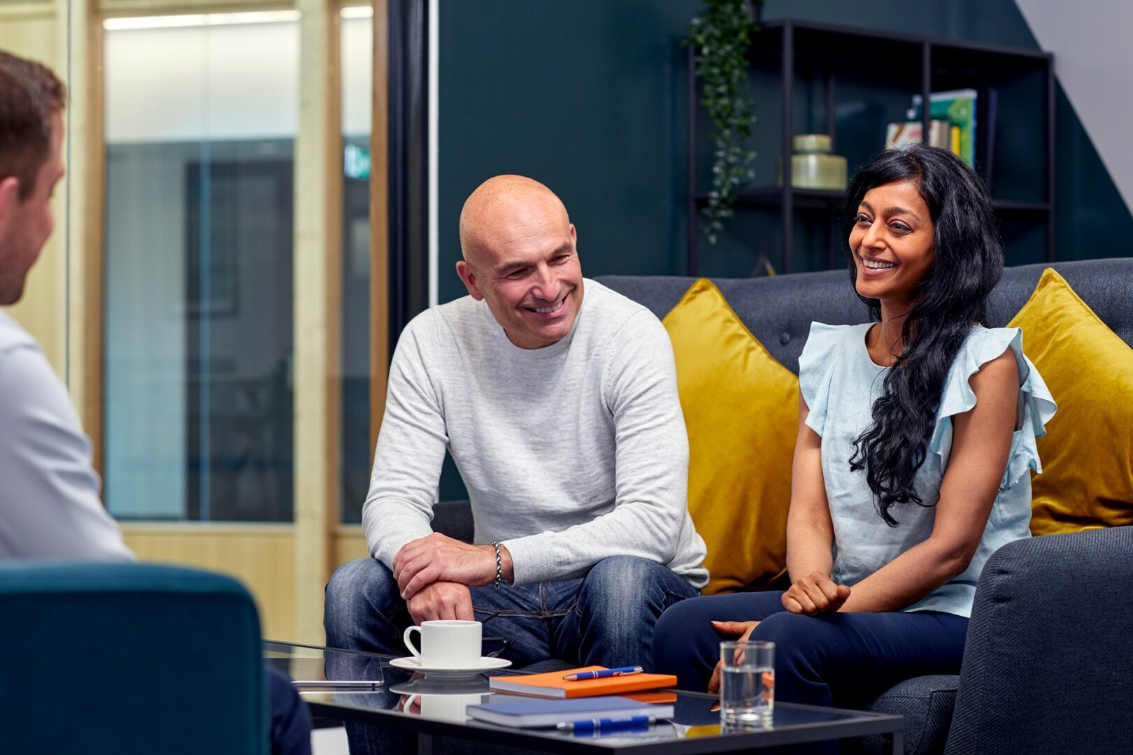 Two people sitting and chatting