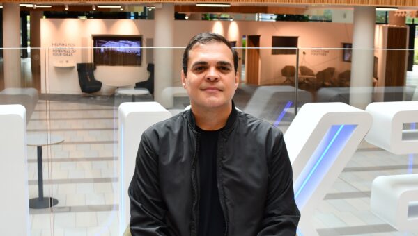 Thiago Bonfim sat infront of Nexus sign